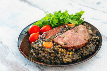 Green lentils with smoked pork sausage smoked choice, carrots and onions