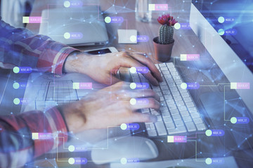 Businessman with computer background with technology theme hologram. Concept of big data. Double exposure.