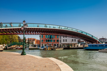 Constitution Bridge over the Grand Canal in Venice in a beautiful early spring day
