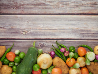 Fresh local vegetables in Asia on a wooden table