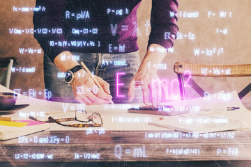 Student or teacher with mathematical and scientific formulas. Concepts of education.