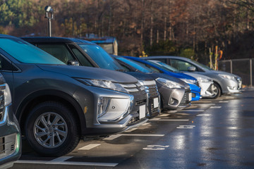 row of cars in parking