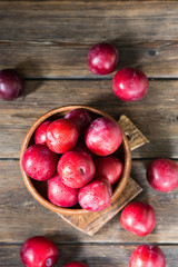 Red plum. Healthy diet. Rustic style