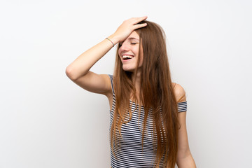 Fototapeta premium Young woman with long hair over isolated white wall has realized something and intending the solution