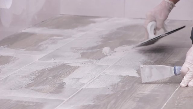 Tile grouting
