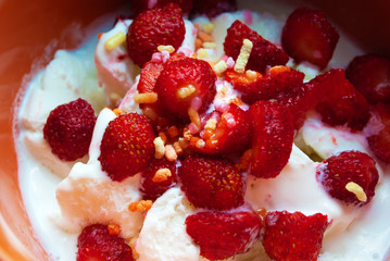 ice cream in a plate with strawberries. dessert