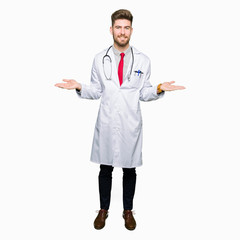 Young handsome doctor man wearing medical coat Smiling showing both hands open palms, presenting and advertising comparison and balance