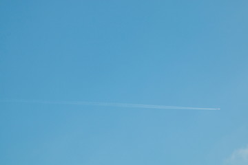 mini plane in blue sky