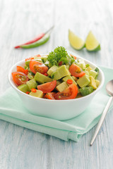 Salsa from avocado, cherry tomatoes and lime.