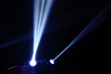 projector spotlights in smoke texture . lights beam for showing presentation . production and...