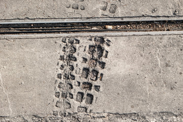 Wheel profile Tracks of a bicycle in fresh concrete