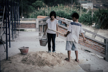 Children are forced to work in the construction area. Human rights concepts stop child abuse,...