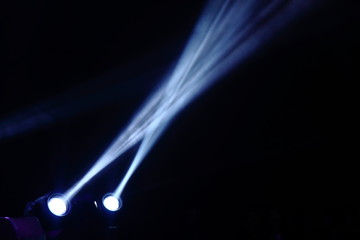 projector spotlights in smoke texture . lights beam for showing presentation . production and...
