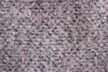 gray with pink Cashmere wool,Background texture of grey pink beige pattern stitch knitted fabric made of cotton or wool.