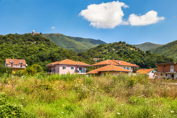 Fototapeta na wymiar City with a church near the sea