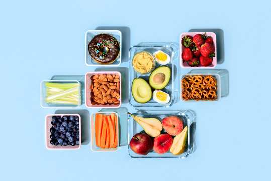 Healthy food concept, lunch boxes filled with fresh snacks