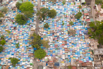 City cemetery in Manila, view from above. Many stone coffins and crypts. Old cemetery with...