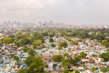 City cemetery in Manila, view from above.City of Manila, in sunny weather. Many stone coffins and...