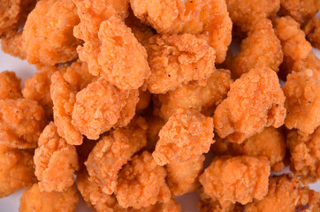 Pop chicken fried on a white background
