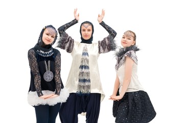 Young girls in design costumes isolated shot