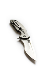 The knife in the center of the frame on a white background. Knife at an angle.