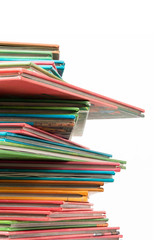 Stack of books on isolated white background.