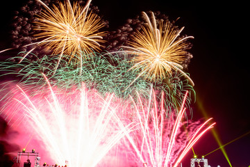 Colorful fireworks against a black night sky.Fireworks for new year. Beautiful colorful fireworks...