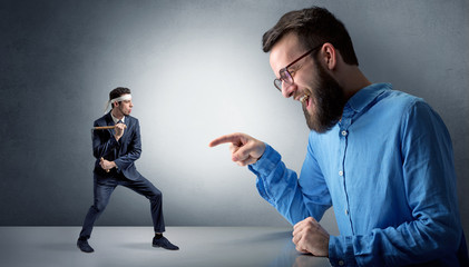 Giant hipster man yelling at a small karate man