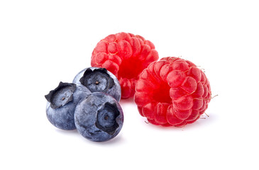 Raspberries with blueberries Isolated on White Background. Ripe berries isolated.