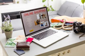 Online shopping website on laptop screen