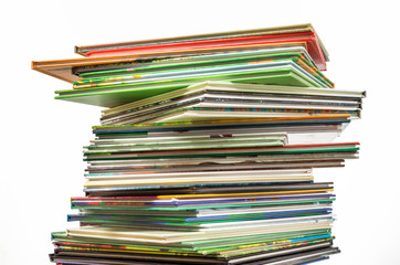 Stack of books on isolated white background.