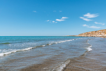 Warm summer sea, empty beach