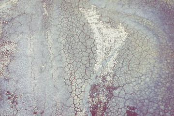 Aerial view of surrealistic industrial place. Dry surface. Desertic landscape. Human impact on the environment. View from above. Abstract industrial background.