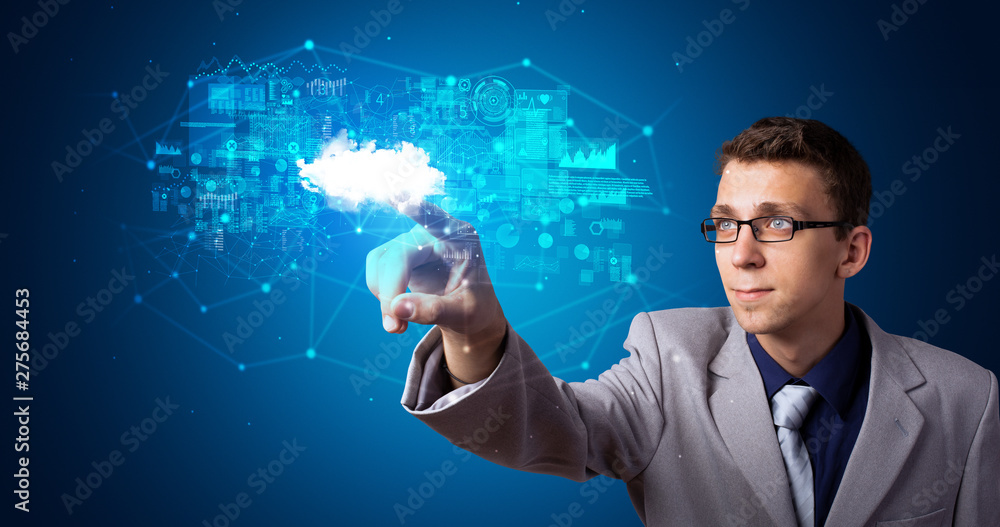 Leinwandbilder Man touching hologram projection displaying information from cloud based system
