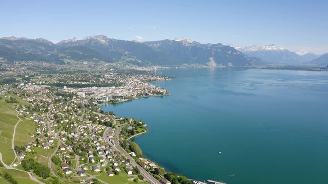 Aerial backward flight above Vevey, Montreux in background