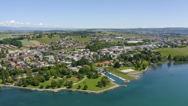 Aerial above Lake Leman, flying towards Preverenges town, Vaud, Switzerland