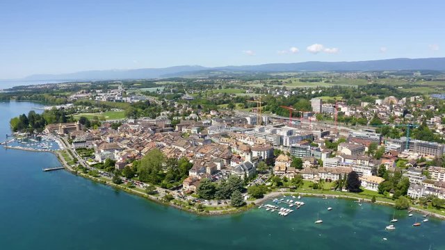 Aerial pull-back from Morges medieval center, Vaud Switzerland