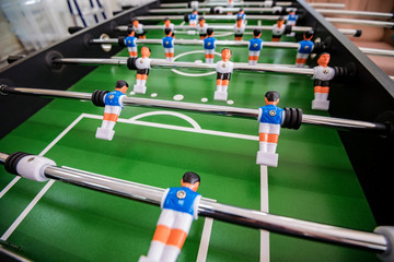 Close up plastic table football game at entertainment center