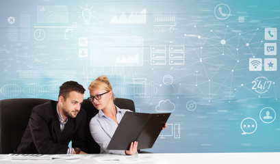 Business person at front desk with workflow concept

