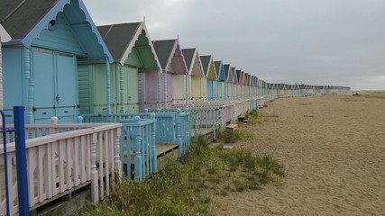 Pastel Beach Huts in Mersea Island