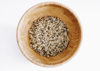 Quinoa in a bowl, white background