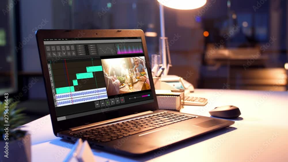 Poster post production, deadline and technology concept - video editor program on laptop computer screen at