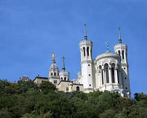Fototapeta na wymiar white basilica called notre dame de fourviere with bell towers L
