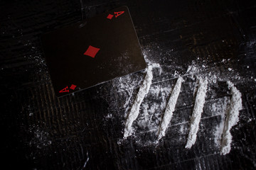 Drug abuse dangerous drugs cocaine heroin heroine addiction concept black background 