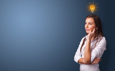 Young person looking for new idea with lighting bulb concept
