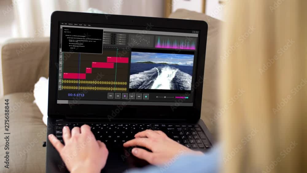 Poster technology, post production and vlog concept - woman working in video editor program on laptop compu