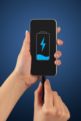 Elegant hand charging cellphone with low battery
