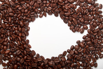 aromatic roasted coffee beans on white background