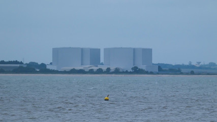 Buoy in front of a nuclear power station in England before the storm