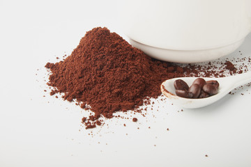aromatic roasted coffee beans on white background